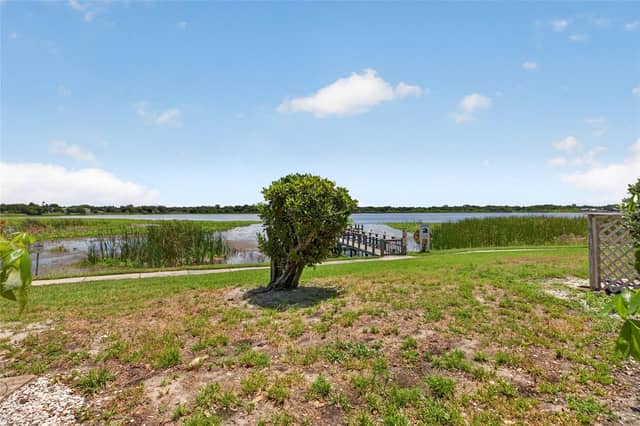 10125 SAILWINDS BLVD N #104 photo